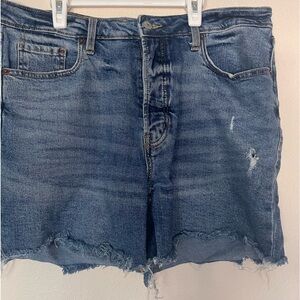 Women denim shorts buttoned down